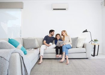 family enjoying under a heating and cooling system