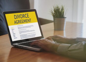 Laptop computer with Divorce Agreement in the screen.